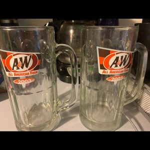 A pair of A&W root beer mugs